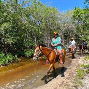 Horseback riders on the rainforest trail at Isla Tropicale (Mahogany Bay), Roatan
