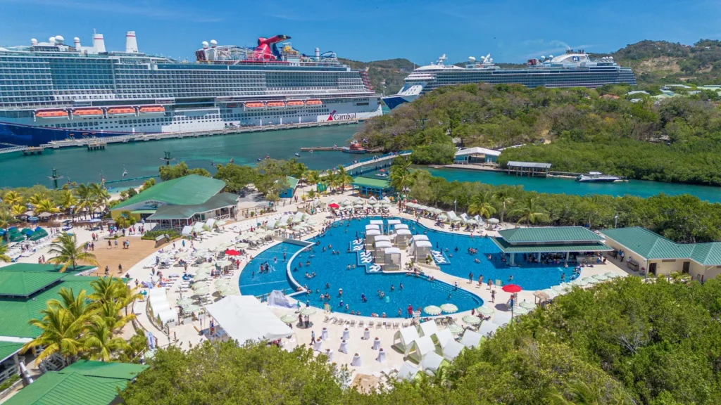 Aerial of Isla Tropicale cruise port with two cruise ships docked in Roatan